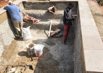 Guys working in the new small pool projects.